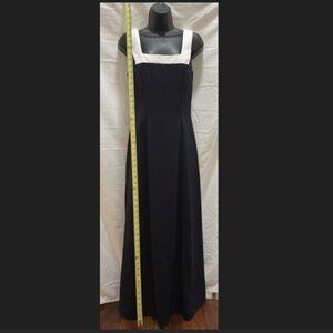 Elegant sleeveless formal with white bow accents